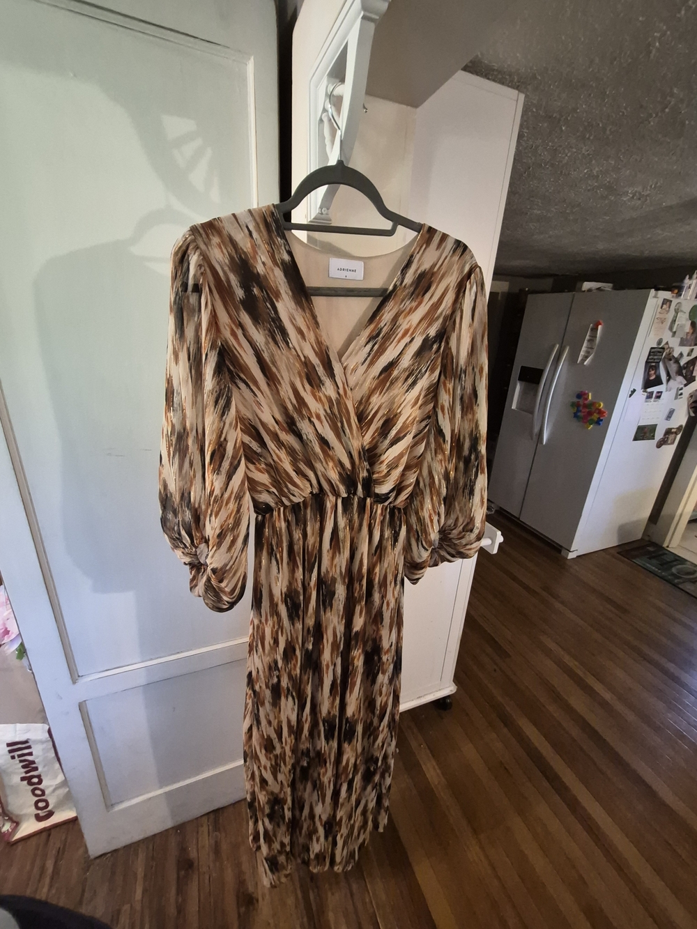 abstract brushstroke print pleated maxi dress in earth-toned shades of brown
